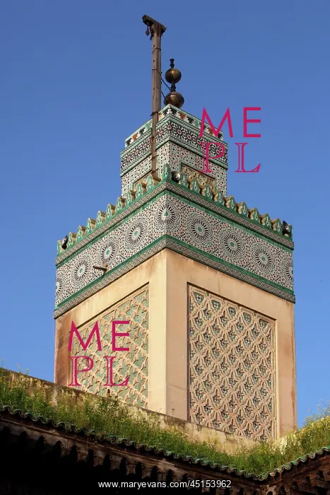 : Fez. Low angle view of Minaret, Bou Inania Madrasa : Fez. Low angle view of Minaret, Bou Inania Madrasa
