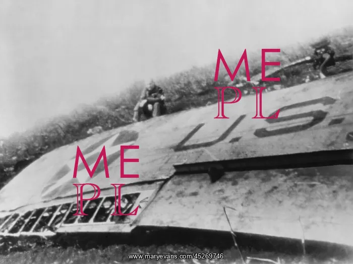 : Lt. Col. Jimmy Doolittle sits by a wing of his : Lt. Col. Jimmy Doolittle sits by a wing of his