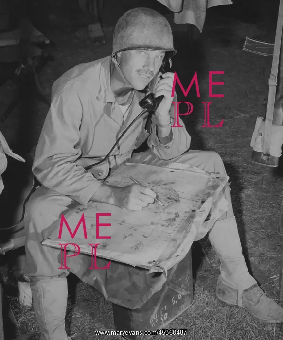 : Lt. Col. Raymond Murray taking a message over field : Lt. Col. Raymond Murray taking a message over field