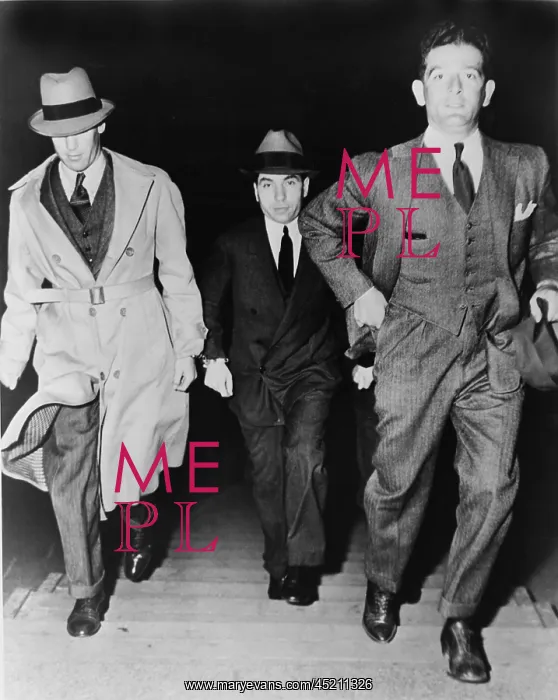 : Lucky Luciano (1896-1962), being escorted ? : Lucky Luciano (1896-1962), being escorted ?