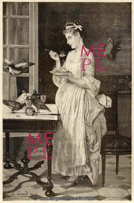 : Lunchtime. A woman stands by a window eating her lunch : Lunchtime. A woman stands by a window eating her lunch