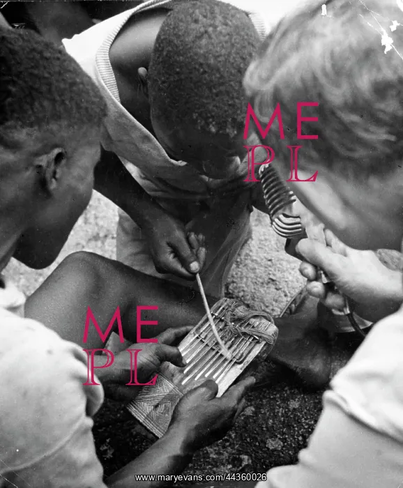 : Luvale men playing Likembe mbira. Nine notes with one : Luvale men playing Likembe mbira. Nine notes with one
