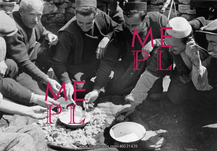 : Macedonians during a meal : Macedonians during a meal