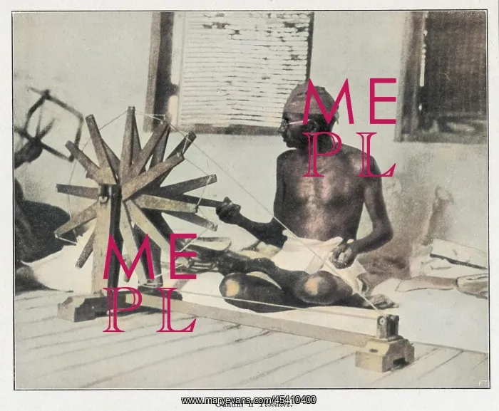 : Mahatma Gandhi spinning at his wheel : Mahatma Gandhi spinning at his wheel