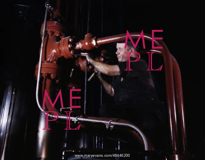: Maintenance mechanic checking pipes at largest : Maintenance mechanic checking pipes at largest