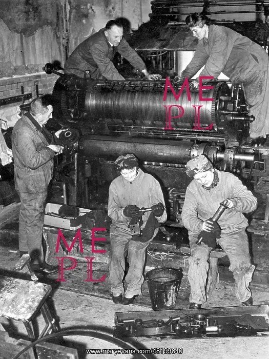 : Maintenance on a printing machine, 1943 : Maintenance on a printing machine, 1943