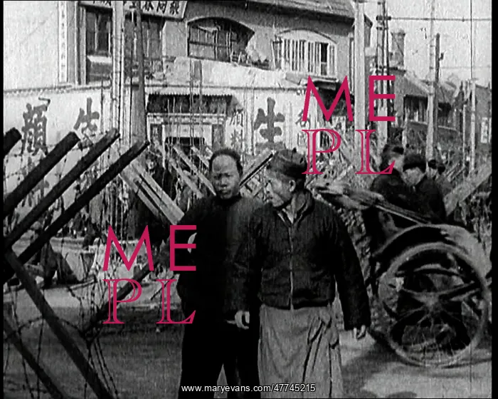 : A Male Chinese Civilian Pulling Rickshaws Through : A Male Chinese Civilian Pulling Rickshaws Through