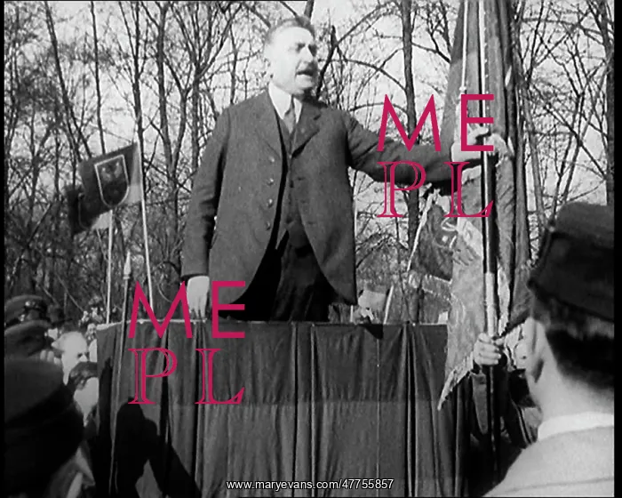 : A Male Civilian Makes a Speech from a Stand : A Male Civilian Makes a Speech from a Stand