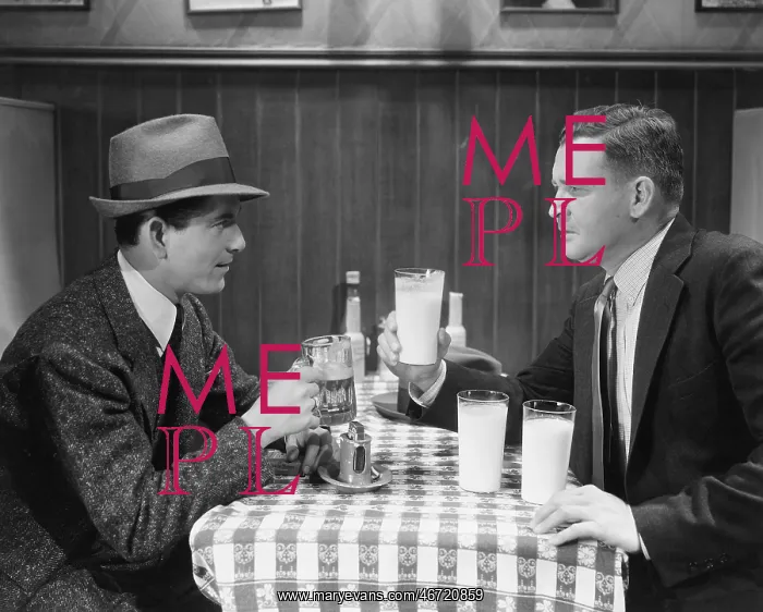 : Two male friends in caf : Two male friends in caf