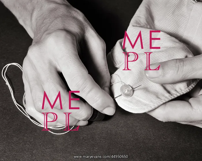 : Male Hand Sewing a Button on Cuff of Shirt : Male Hand Sewing a Button on Cuff of Shirt