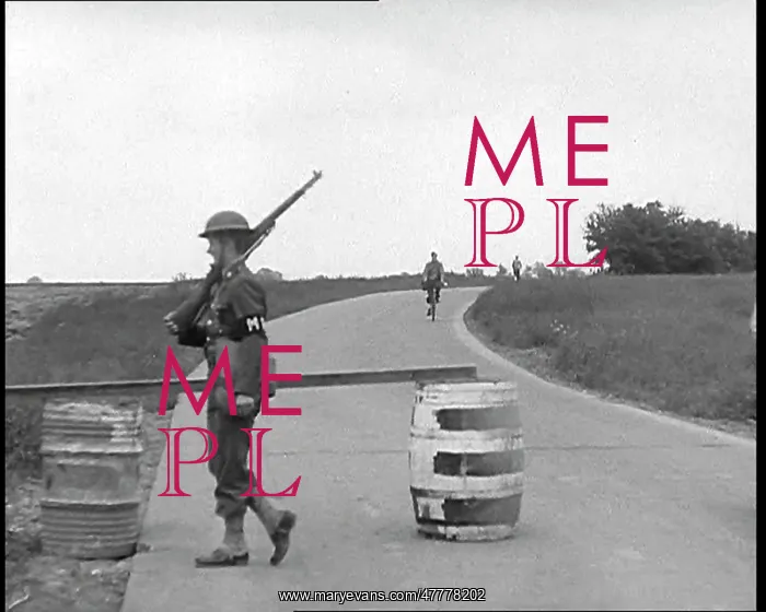 : A Male Soldier Manning a Checkpoint on a Road : A Male Soldier Manning a Checkpoint on a Road