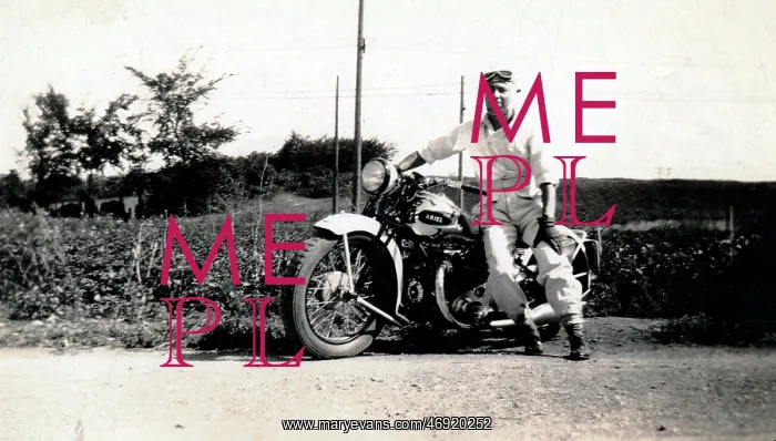 : Man on his 1937 Ariel Square Four motorcycle : Man on his 1937 Ariel Square Four motorcycle