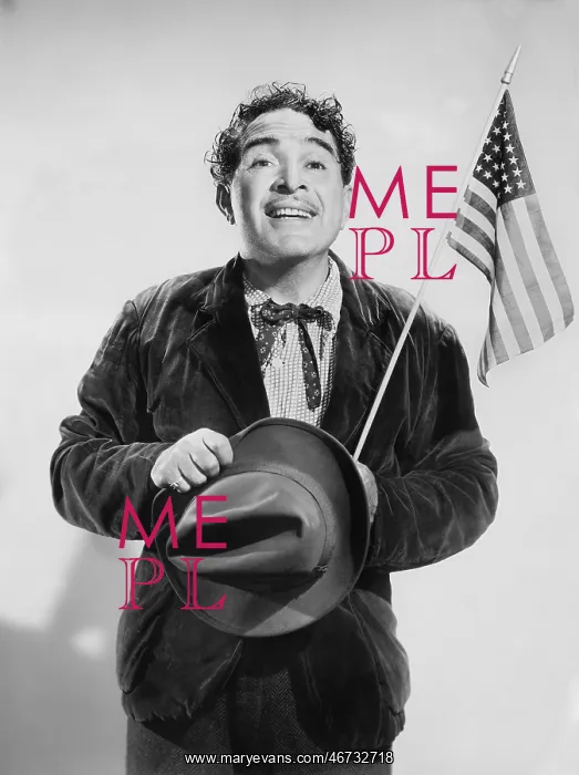 : Man with the American flag in his hand smiling : Man with the American flag in his hand smiling
