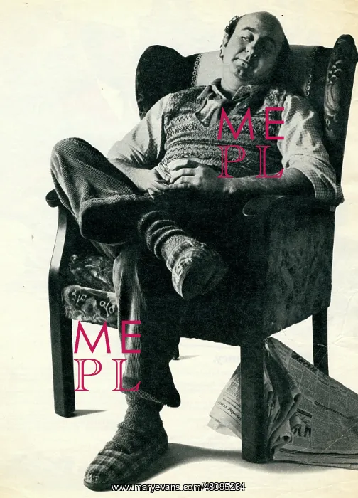  : Man asleep in a chair