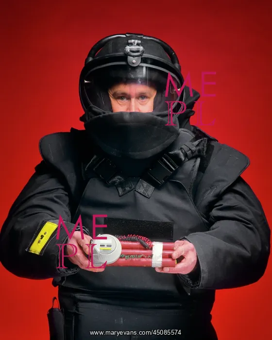 : Man Bomb Squad Technician Looking at the Camera : Man Bomb Squad Technician Looking at the Camera