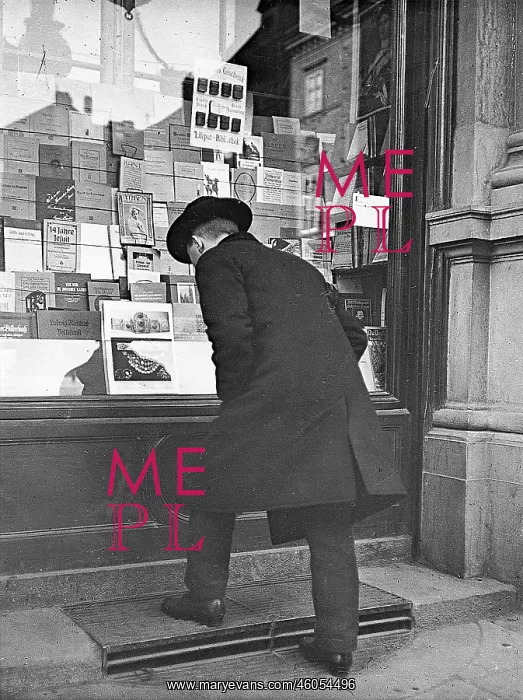: A man by the bookstore : A man by the bookstore