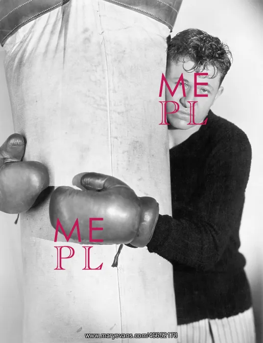 : Man in boxing gloves hugging the punching bag : Man in boxing gloves hugging the punching bag