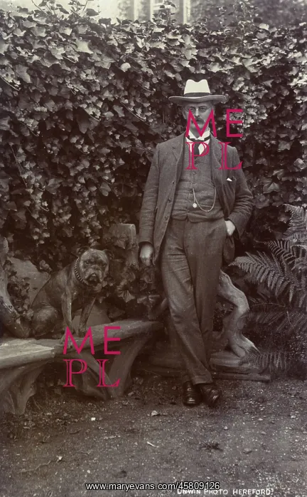  : Man with a bulldog in a garden