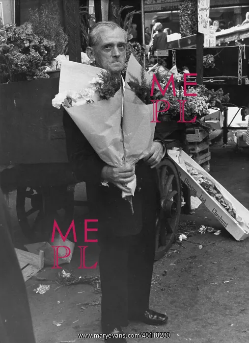 : Man with bunches of flowers : Man with bunches of flowers