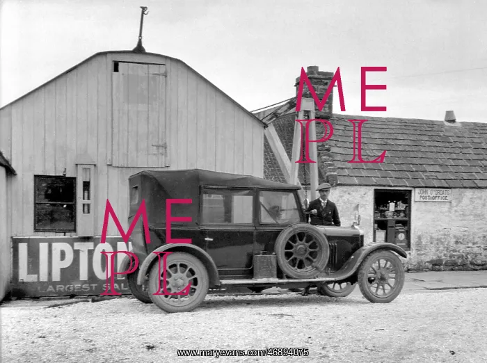 : Man and car outside Post Office, John o'Groats, Scotland : Man and car outside Post Office, John o'Groats, Scotland