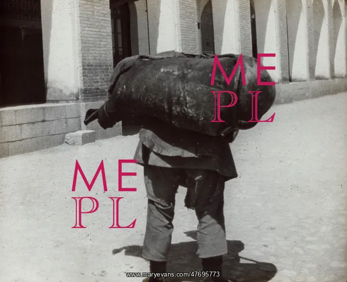  : Man carrying a heavy weight