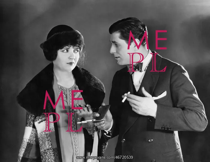 : Man with cigarettes talking to woman : Man with cigarettes talking to woman