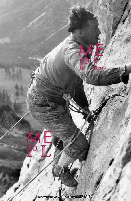 : MAN CLIMBS STEEPLY 1930S : MAN CLIMBS STEEPLY 1930S