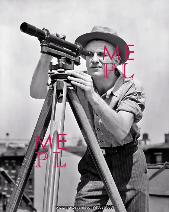 : Man Construction Supervisor Using a Surveyor's : Man Construction Supervisor Using a Surveyor's