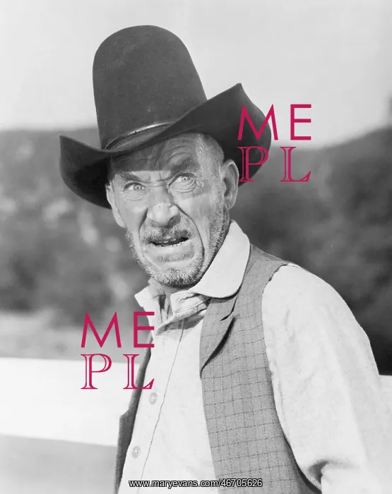 : Man in a cowboy hat looking angry : Man in a cowboy hat looking angry