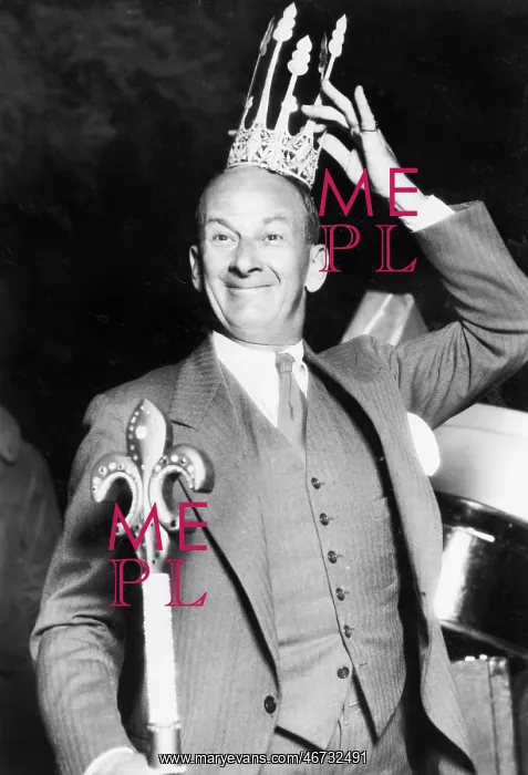 : Man with a crown a scepter looking proud : Man with a crown a scepter looking proud