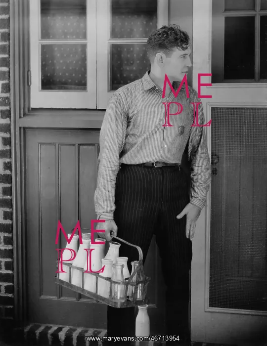 : Man delivering milk : Man delivering milk