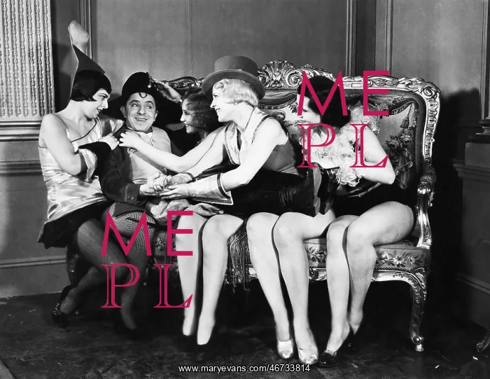 : Man dressed Napoleon surrounded by young women : Man dressed Napoleon surrounded by young women