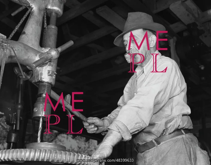: Man drilling a gear for the De Land community : Man drilling a gear for the De Land community