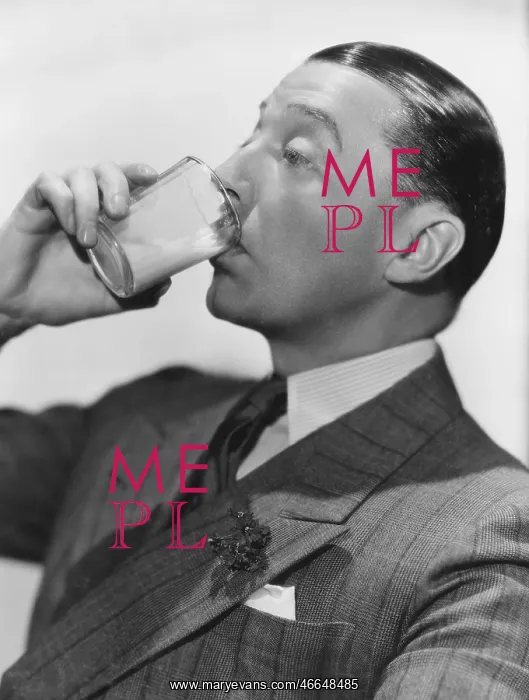 : Man drinking beverage : Man drinking beverage