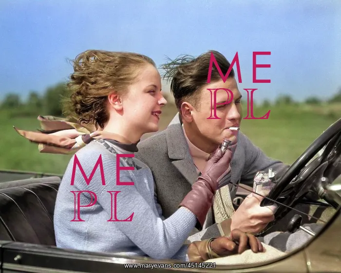 : Man Driving Convertible Automobile While Girlfriend : Man Driving Convertible Automobile While Girlfriend