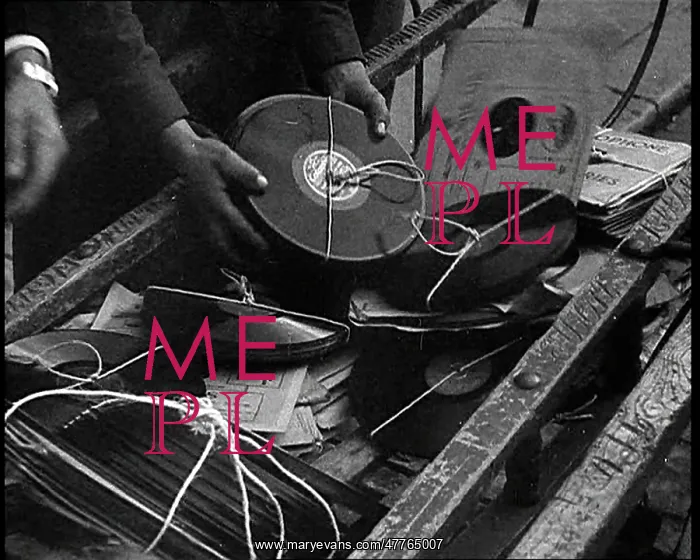 : A Man Dumping Old Vinyls to Use For War Materials : A Man Dumping Old Vinyls to Use For War Materials