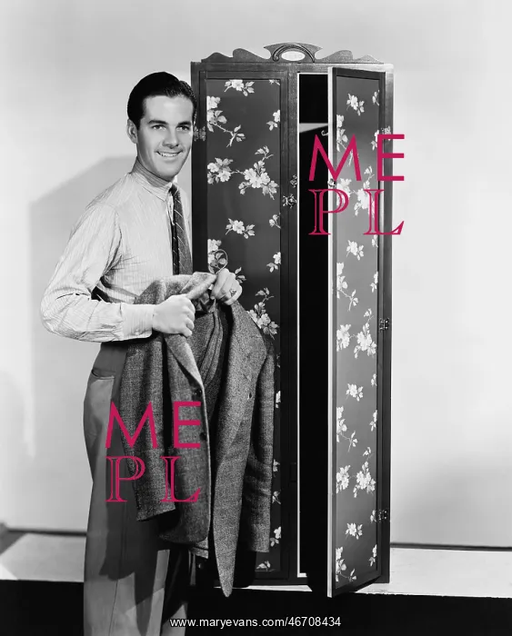  : Man getting dressed