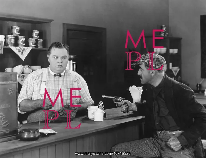 : Man with a gun holding up a diner owner : Man with a gun holding up a diner owner
