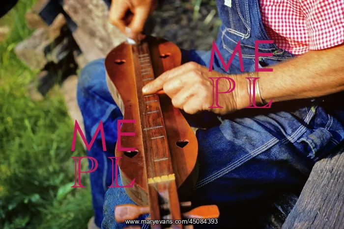 : Man Hands Playing a Mountain Dulcimer in Mountains in NC : Man Hands Playing a Mountain Dulcimer in Mountains in NC