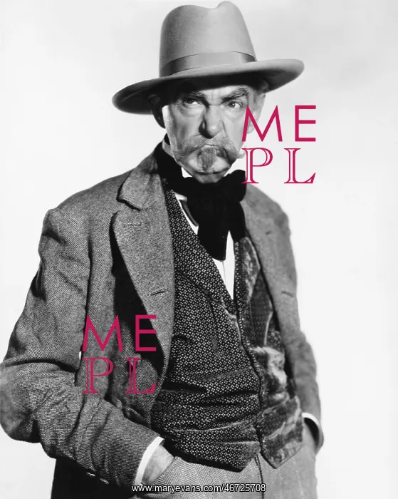  : Man in a hat and vest looking grumpy