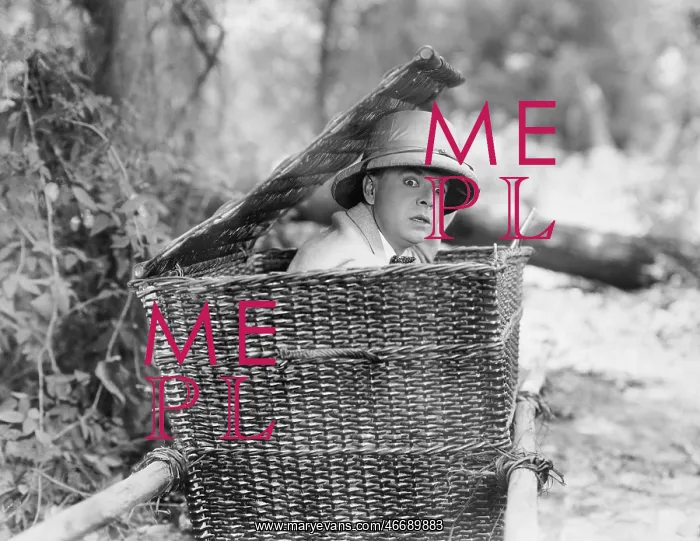 : Man hiding himself in a basket : Man hiding himself in a basket