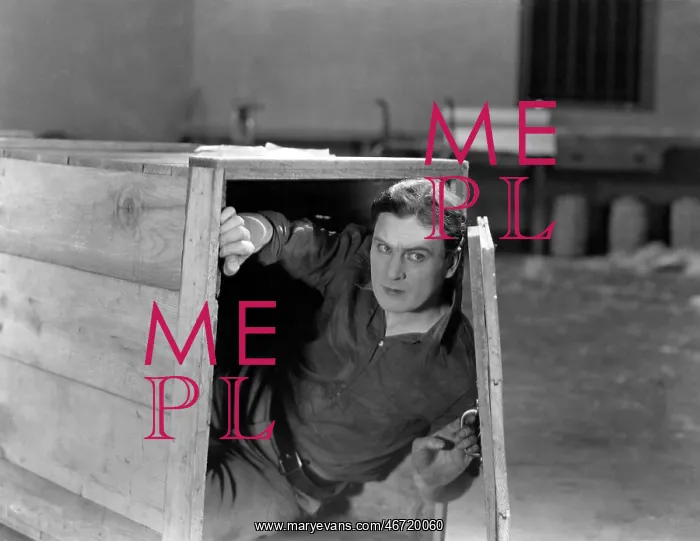 : Man hiding in wooden crate : Man hiding in wooden crate