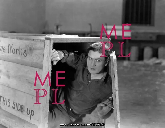 : Man hiding in wooden crate : Man hiding in wooden crate