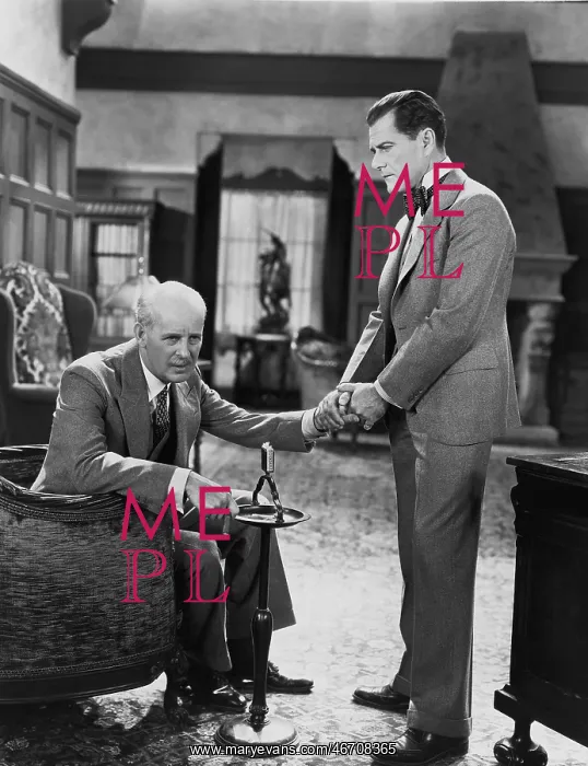 : Man holding elderly father's hand : Man holding elderly father's hand