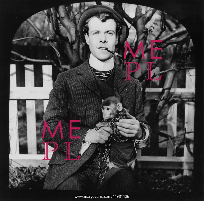 : Man holding a Monkey : Man holding a Monkey