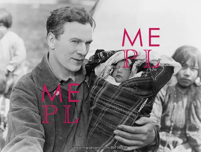: Man holding sleeping baby in papoose : Man holding sleeping baby in papoose