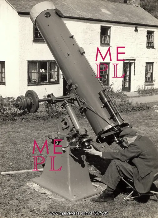 : Man with large telescope : Man with large telescope
