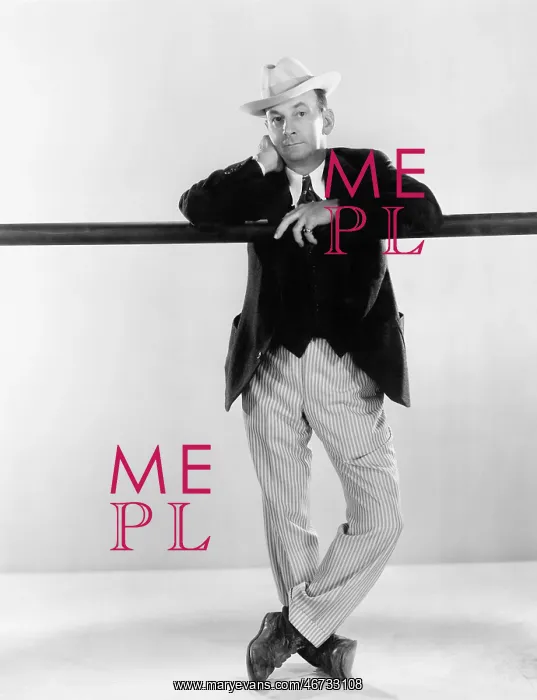  : Man leaning against a balance beam