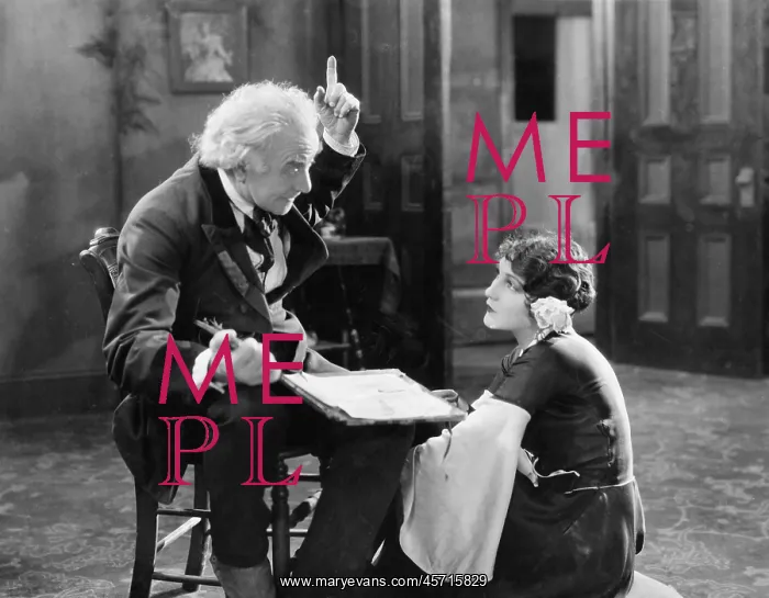  : Man lecturing a young woman