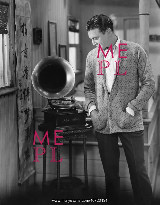 : Man listening to phonograph : Man listening to phonograph